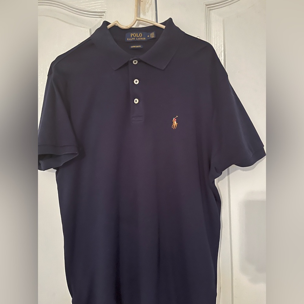 Polo, navy blue, like new, extremely comfortable. Size M for men’s, slim fit.